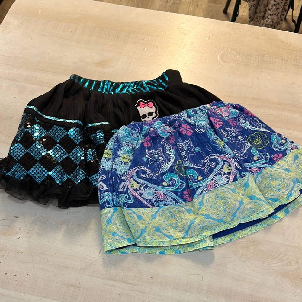 Girls size 7/8 skirts with elastic waist and glittery detail